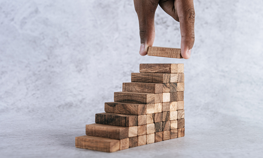 Stacking wooden blocks is at risk in creating business growth id Stacking wooden blocks is at risk in creating business growth ideas.